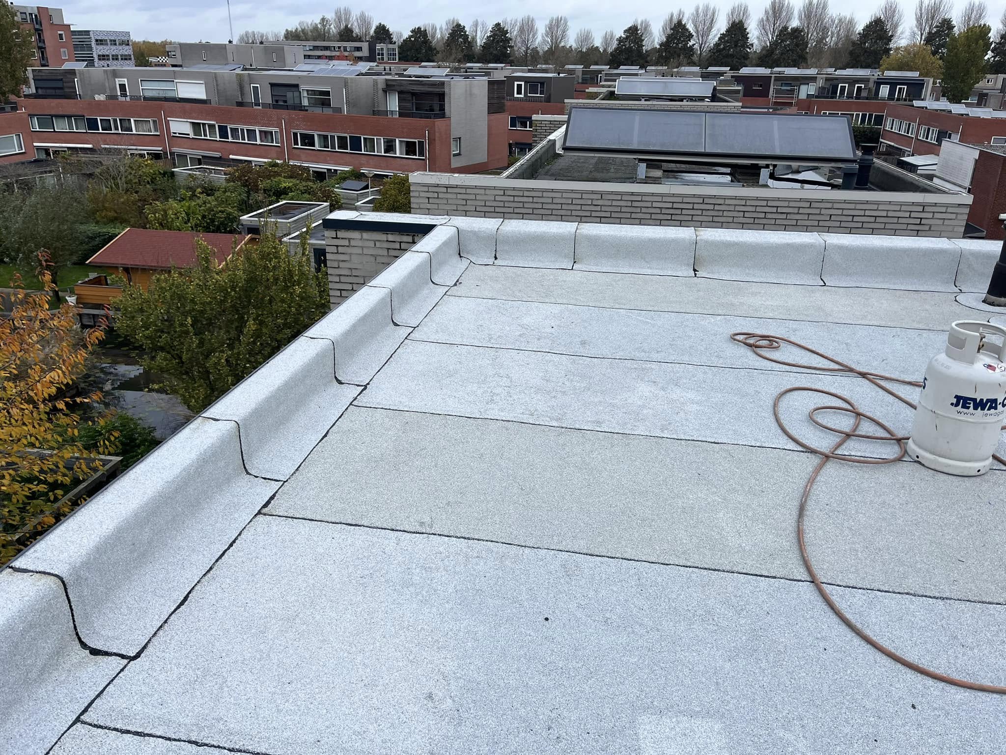 Plat Dak Renovatie - Wooncomplex Amstelveen